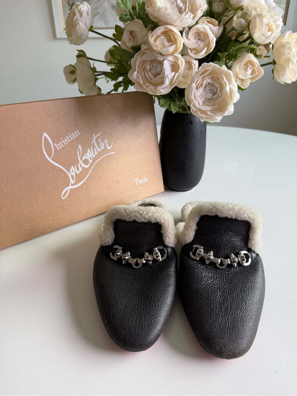 Christian Louboutin Black Leather Shearling-Trim Mules with Silver Chain